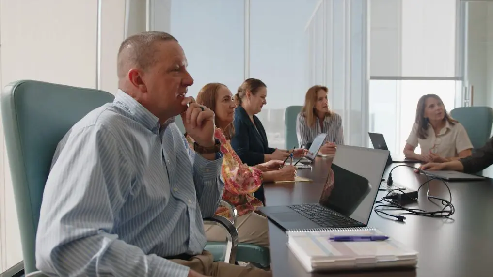 Kendal leaders in board room